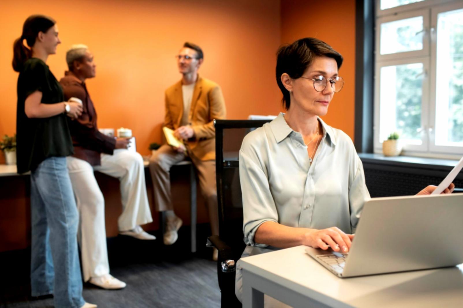 International student reviewing financial documents in modern study space